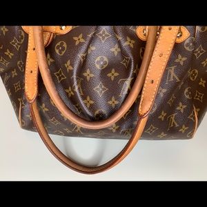 Louis Vuitton 
Purchased in Seattle
Tivoli GM